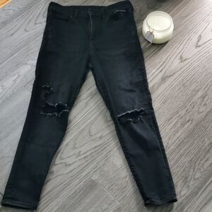 American Eagle Next level stretch black high rise ripped jeans. Size 10 short